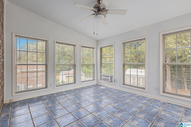 unfurnished sunroom featuring a wealth of natural light, ceiling fan, and vaulted ceiling