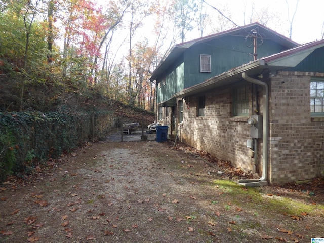 view of home's exterior with a patio