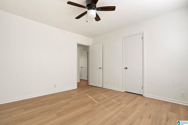 unfurnished bedroom featuring ceiling fan and light hardwood / wood-style flooring