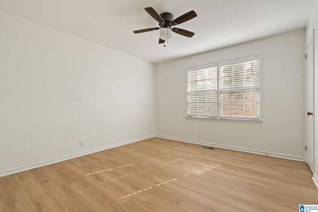 unfurnished room with ceiling fan and light hardwood / wood-style flooring