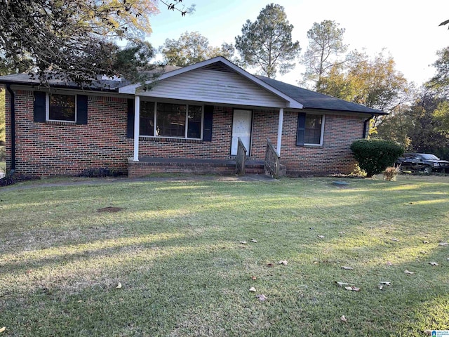 ranch-style house with a front lawn