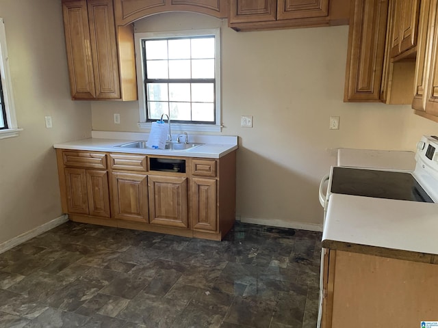 kitchen with stove and sink