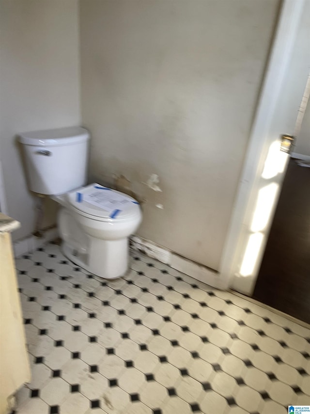 bathroom featuring toilet