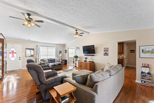 living room featuring a textured ceiling, ceiling fan, dark hardwood / wood-style flooring, and lofted ceiling