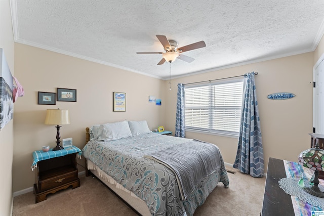 carpeted bedroom featuring a textured ceiling, ceiling fan, and crown molding