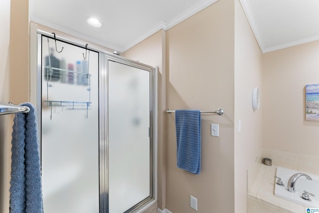 bathroom featuring shower with separate bathtub and crown molding