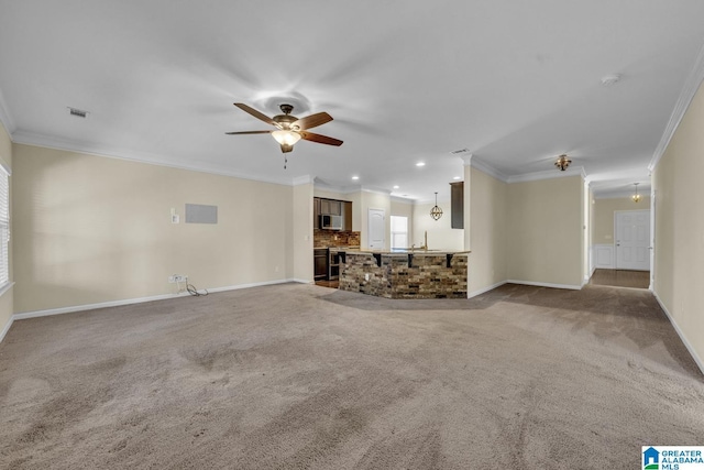 unfurnished living room with light carpet, ceiling fan, and ornamental molding