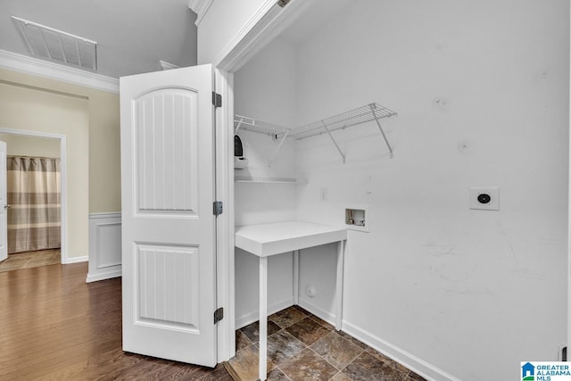 laundry room with hookup for a washing machine, dark wood-type flooring, and hookup for an electric dryer