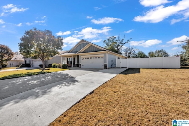 view of front facade with a front lawn and a garage