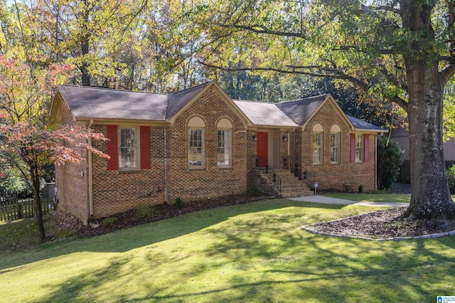 ranch-style house with a front lawn