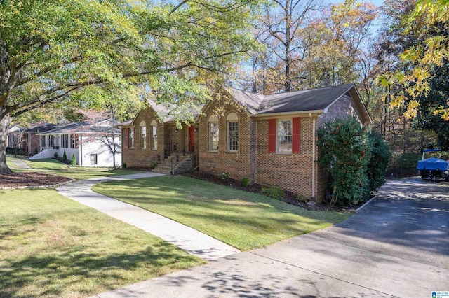 view of front of home with a front yard