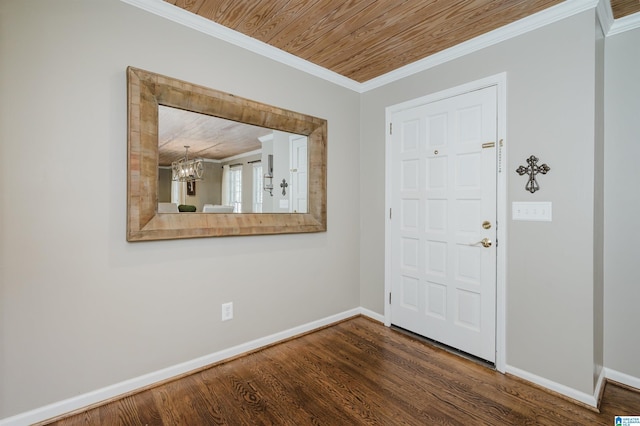 entryway with dark hardwood / wood-style flooring, wooden ceiling, crown molding, and a chandelier