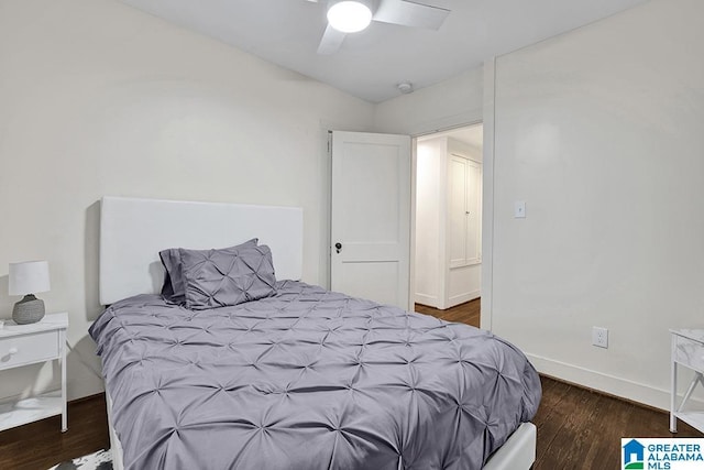 bedroom featuring ceiling fan and dark hardwood / wood-style floors