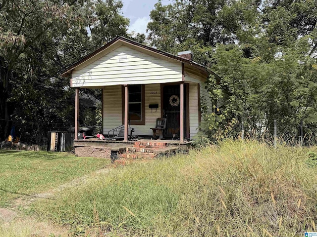 bungalow with a front yard