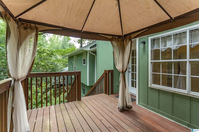 wooden deck with a gazebo