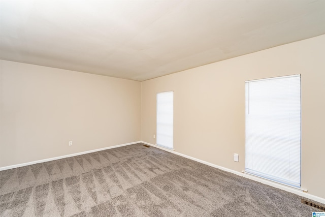 empty room featuring carpet