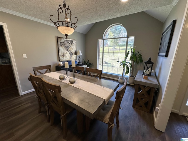 dining room with dark wood-type flooring, crown molding, vaulted ceiling, a textured ceiling, and a chandelier