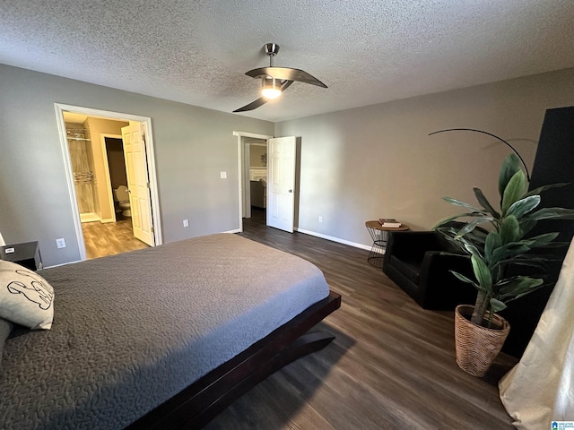 bedroom featuring a textured ceiling, ceiling fan, ensuite bathroom, and dark hardwood / wood-style floors