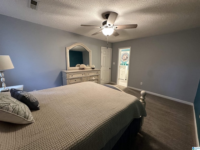 carpeted bedroom featuring a textured ceiling and ceiling fan