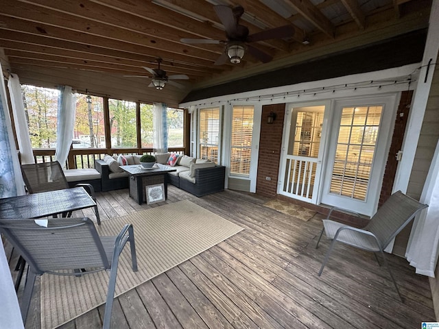 sunroom / solarium with ceiling fan