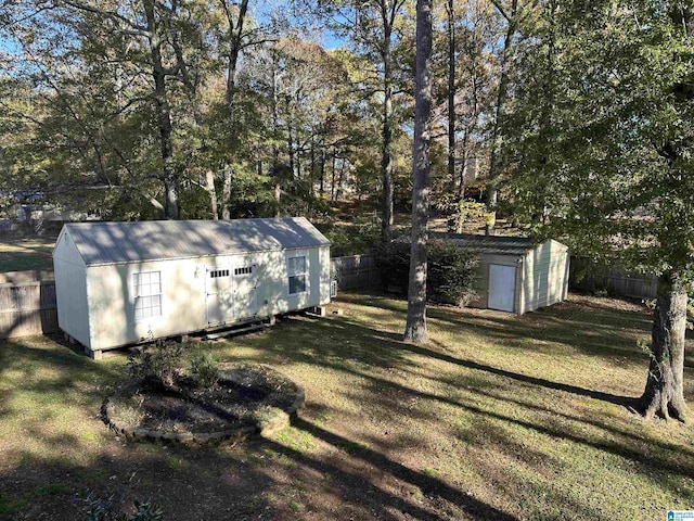 view of outbuilding featuring a lawn