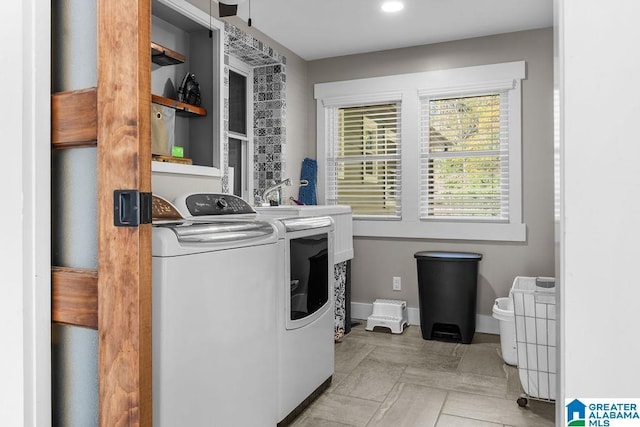 washroom featuring independent washer and dryer