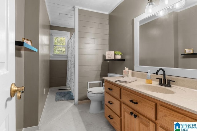 bathroom featuring vanity, a shower with shower curtain, and toilet