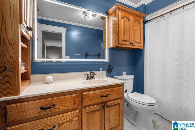 bathroom with vanity, toilet, and ornamental molding