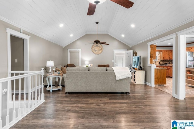 living room featuring dark hardwood / wood-style floors, crown molding, lofted ceiling, and wood ceiling