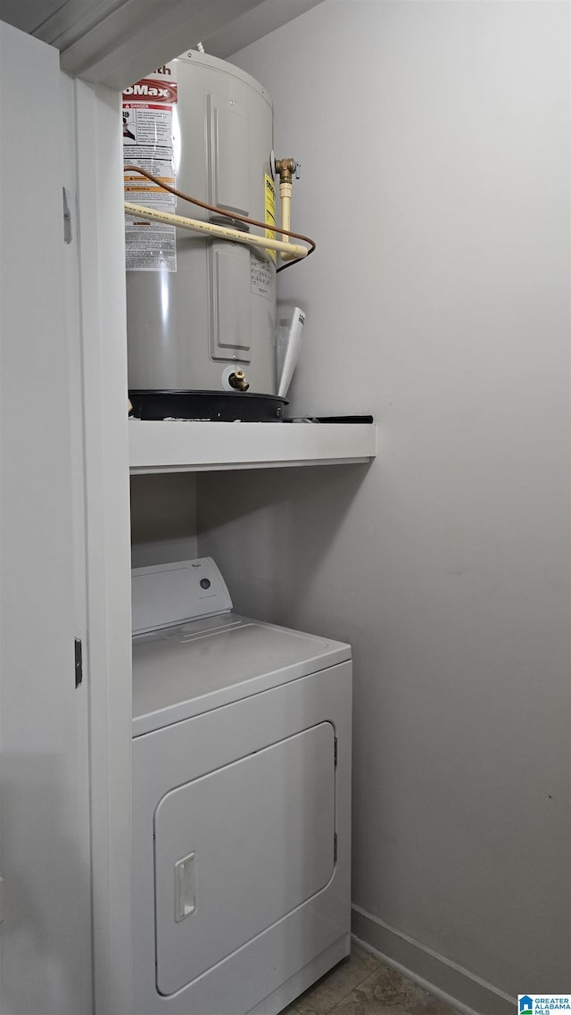 laundry area with washer / dryer and water heater