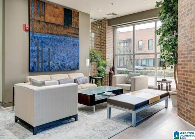 401 20th St Unit 208, Birmingham, AL 35233 - community lobby featuring brick wall