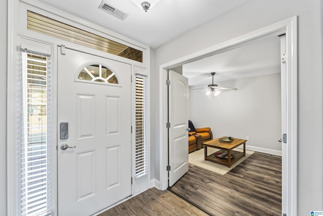 foyer featuring dark hardwood / wood-style flooring and ceiling fan