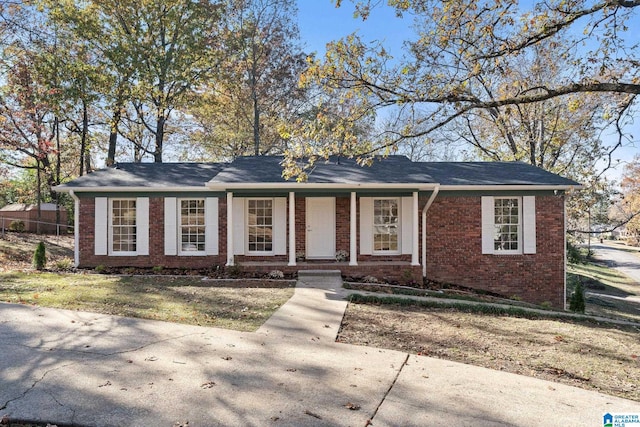 ranch-style home featuring a porch