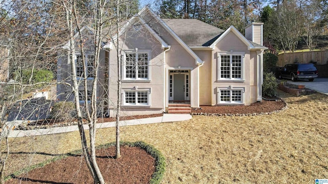 view of front of home with a front yard