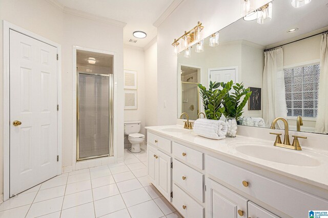 169 Glen Abbey Way, Alabaster, AL 35007 - full bath with ornamental molding, double vanity, tile patterned flooring, a shower stall, and toilet