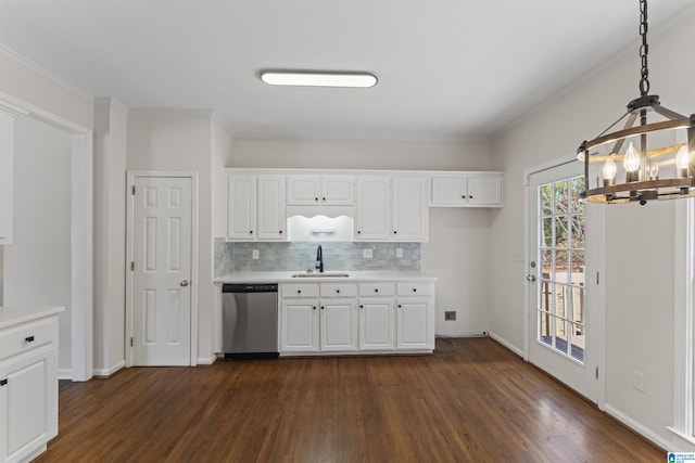 kitchen featuring stainless steel dishwasher, sink, white cabinets, dark hardwood / wood-style floors, and hanging light fixtures