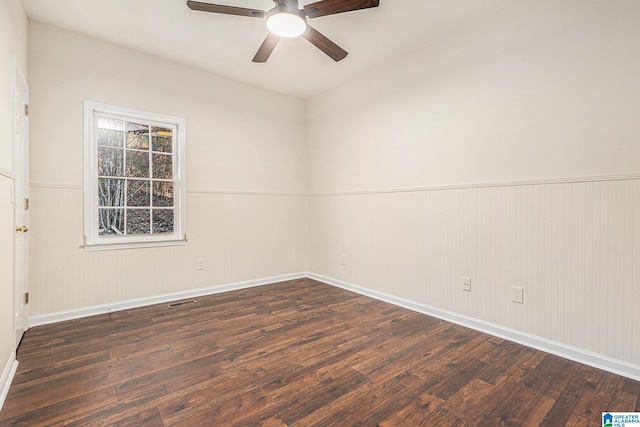 169 Glen Abbey Way, Alabaster, AL 35007 - empty room featuring dark wood finished floors, a ceiling fan, baseboards, and wainscoting