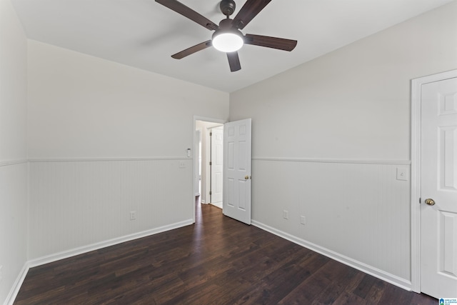 unfurnished bedroom with dark hardwood / wood-style floors and ceiling fan