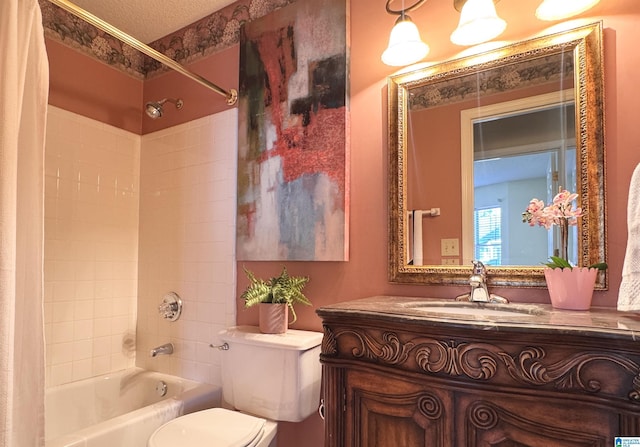 full bathroom featuring vanity, a textured ceiling, toilet, and shower / bath combo with shower curtain