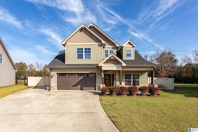 craftsman-style house with a front lawn and a garage