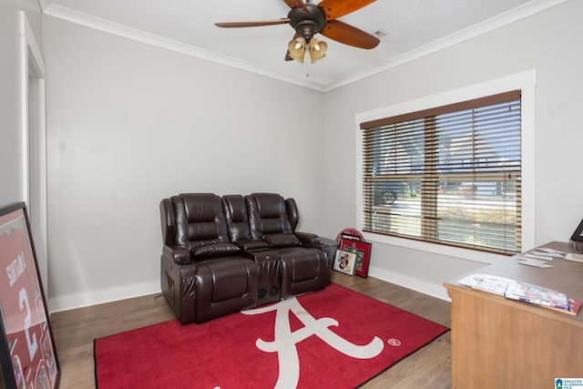 interior space with ceiling fan, ornamental molding, and dark wood-type flooring