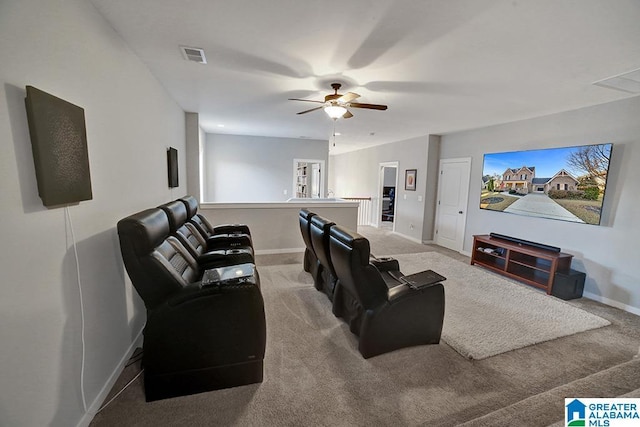 carpeted living room with ceiling fan