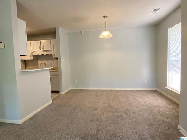 interior space with light colored carpet