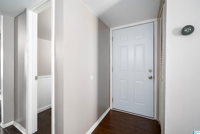 hall featuring dark wood-type flooring