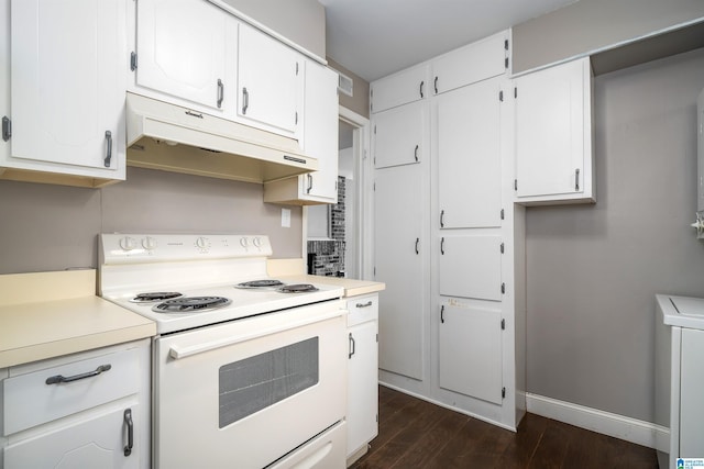 kitchen with white cabinetry, dark wood-type flooring, and electric stove