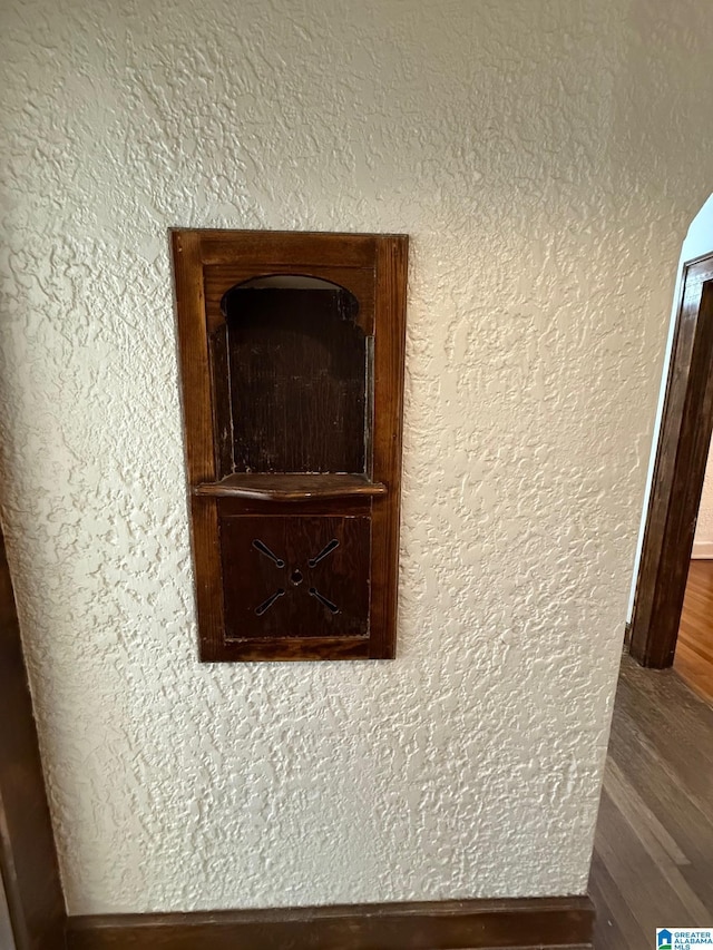 interior details with hardwood / wood-style flooring