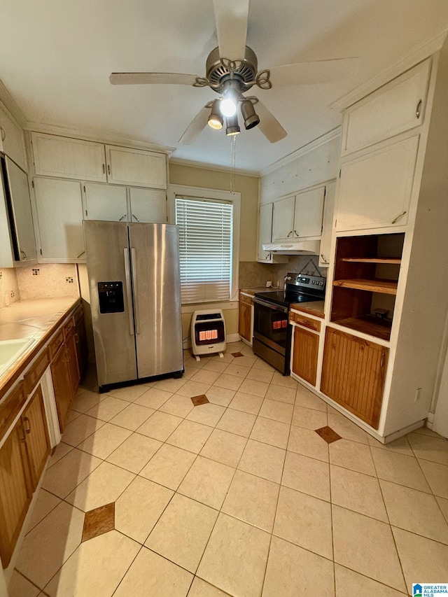 kitchen with stainless steel refrigerator with ice dispenser, electric range, decorative backsplash, light tile patterned floors, and heating unit