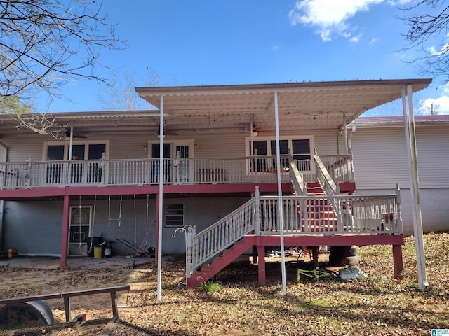 420 Dennis St, Weaver, AL 36277 - rear view of property featuring stairway and a wooden deck