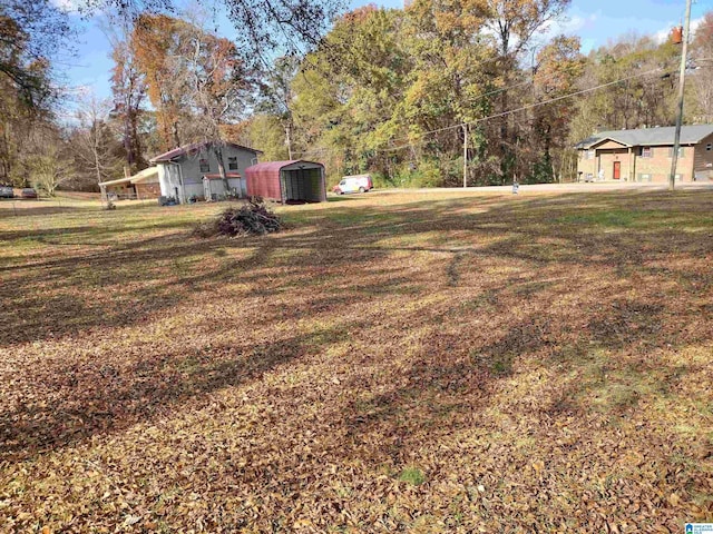 view of yard with a carport