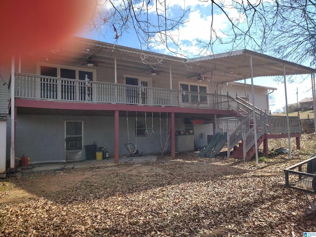 420 Dennis St, Weaver, AL 36277 - rear view of property featuring a ceiling fan and stairway